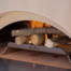 Baking bread in a wood burning oven: at what temperature and for how long? | Alfa Forni
